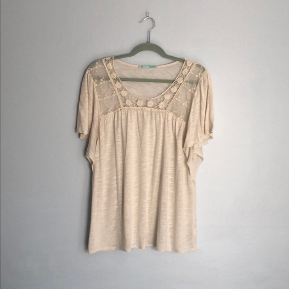 Fun, cream colored, lacy top